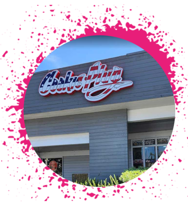 University-Heights-Cookie-Plug-in-San-Diego-CA-Order-Now Hot pink paint splashes around a circle picture of a gray store front that says 'Cookie Plug'